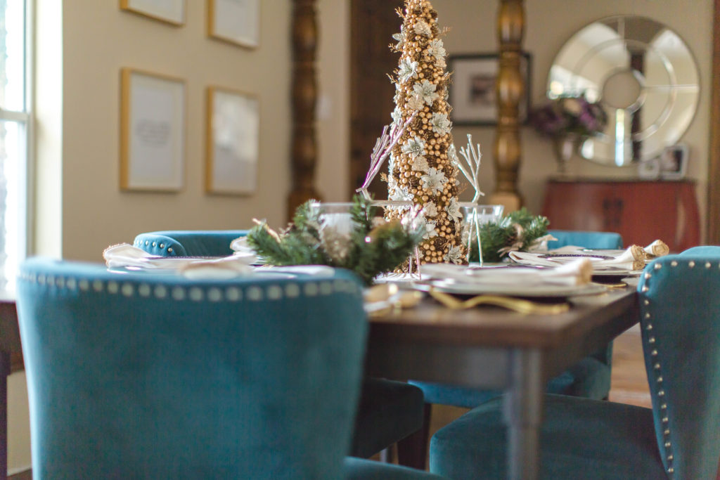 Christmas table setting of blue, gold, and green | How to Host a Holiday Meal like a BOSS